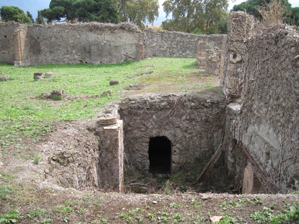 I.3.3 Pompeii. September 2010. Upper peristyle area, looking south over collapsed area, from room in north-west corner. Looking south along west portico area. Photo courtesy of Drew Baker.