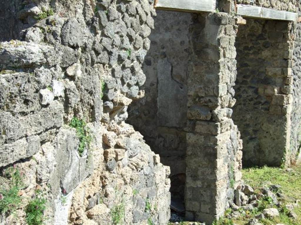 1.3.3 Pompeii. March 2009. Two doorways to middle rooms in east side of upper level of peristyle area.