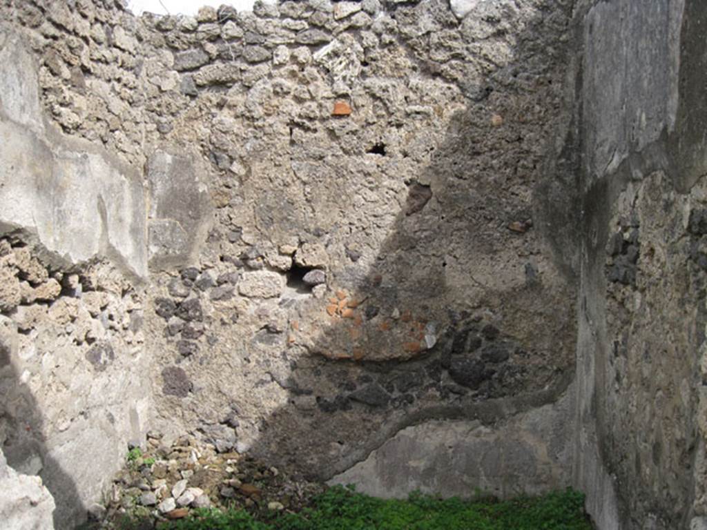 I.3.3 Pompeii. September 2010. Upper peristyle area, east wall of cubiculum reached by central doorway of the three above. Photo courtesy of Drew Baker.