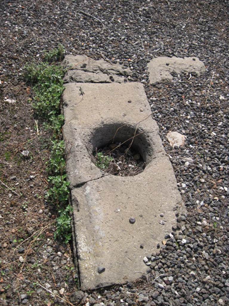 I.3.3 Pompeii. September 2010. Looking south, showing detail of remains of impluvium cistern hole. Photo courtesy of Drew Baker.