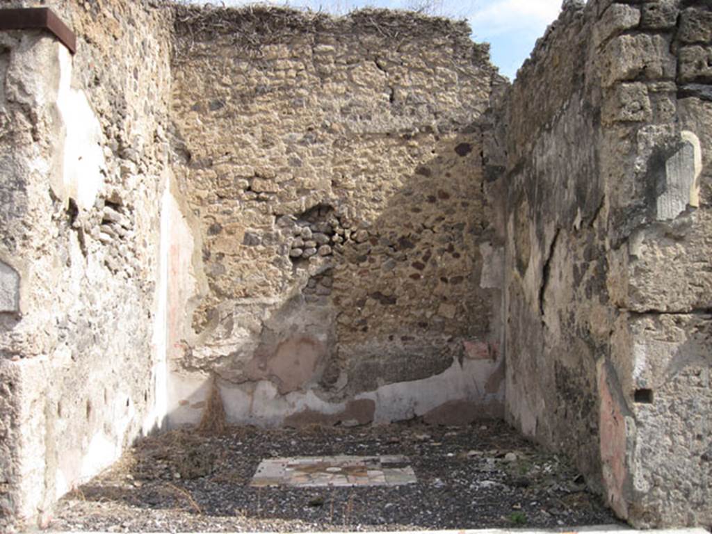 I.3.3 Pompeii. September 2010. Looking east from atrium into tablinum. Photo courtesy of Drew Baker. According to Fiorelli, the tablinum had walls ornamented by paintings of four chariots driven by cupids. See Pappalardo, U., 2001. La Descrizione di Pompei per Giuseppe Fiorelli (1875). Napoli: Massa Editore. (p. 38) According to Mau, on the three walls were found three small paintings representing cupids leading chariots or carriages. Each painting was on a white background surrounded by a red striped edge. See BdI, (Bull. Inst.) 1873, p.236. According to Sogliano’s description, found in the tablinum on a white background were – Painting of a cupid on a cart pulled by two goats (357), cupid on a cart pulled by two horses (358), cupid on a cart pulled by two deer, and (destroyed) similar to the above but with the cart represented sideways (360) See Sogliano, A., 1879. Le pitture murali campane scoverte negli anni 1867-79. Napoli: Giannini. (p.62)