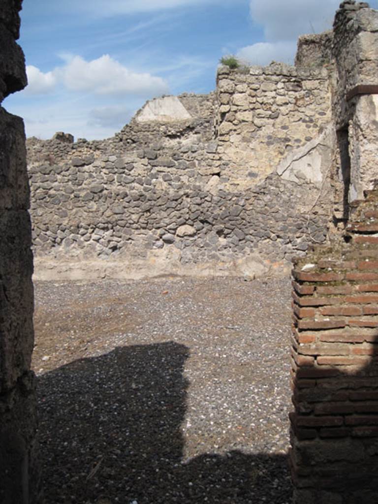 I.3.3 Pompeii. September 2010.
Looking north out of doorway leading into atrium, in room next to corridor leading to kitchen area.
Photo courtesy of Drew Baker.