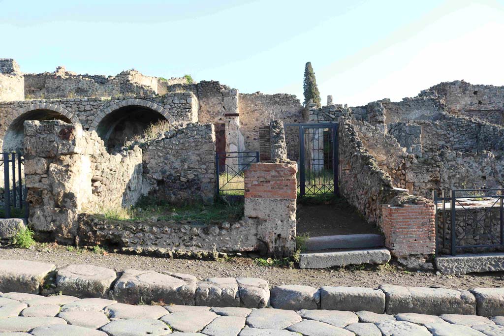 I.3.4 Pompeii. December 2018.
Looking east across Via Stabiana towards entrance doorways, I.3.4, centre left. Photo courtesy of Aude Durand.