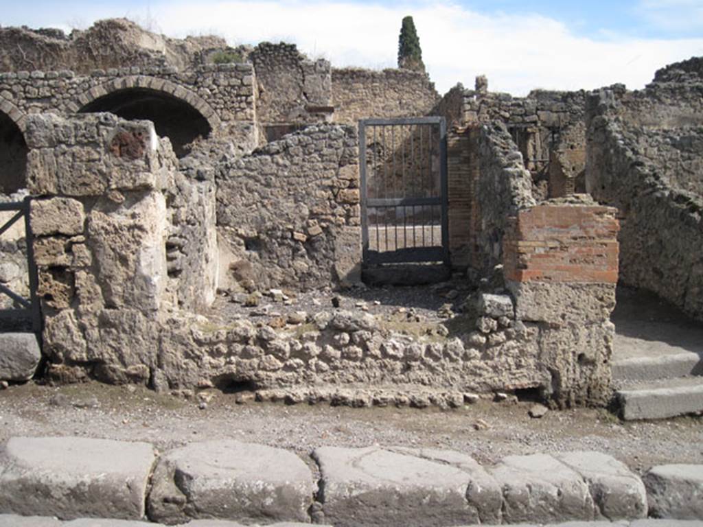 I.3.4 Pompeii. September 2010. Looking east across Via Stabiana towards entrance doorway. Photo courtesy of Drew Baker.
According to CTP, the street entrance was walled up as of April 1982. See Van der Poel, H. B., 1986. Corpus Topographicum Pompeianum, Part IIIA. Austin: University of Texas. (p.6)