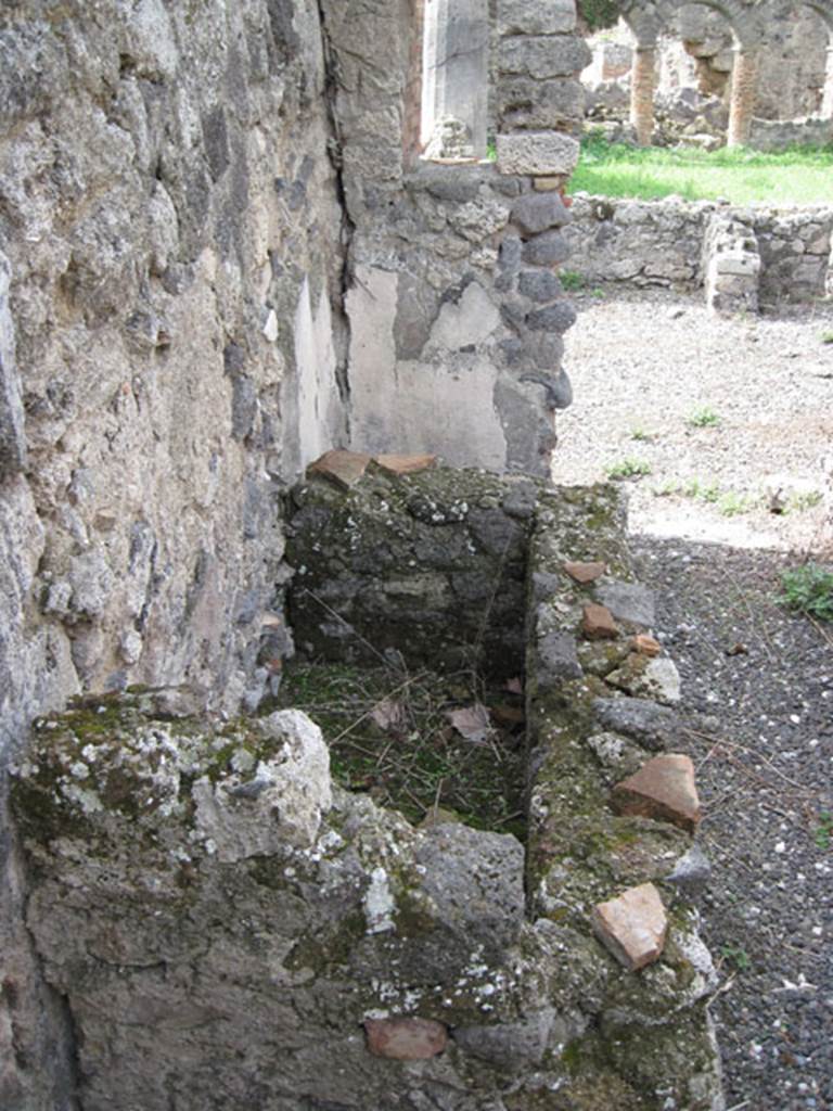 I.3.8b Pompeii. September 2010. Detail of rectangular feature against south wall of corridor. Looking west. Photo courtesy of Drew Baker.