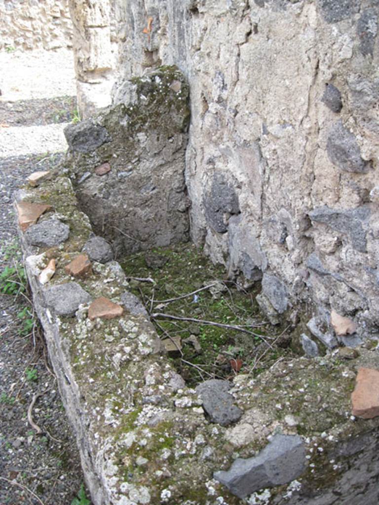I.3.8b Pompeii. September 2010. Detail of rectangular feature against south wall of corridor. Looking east. Photo courtesy of Drew Baker.