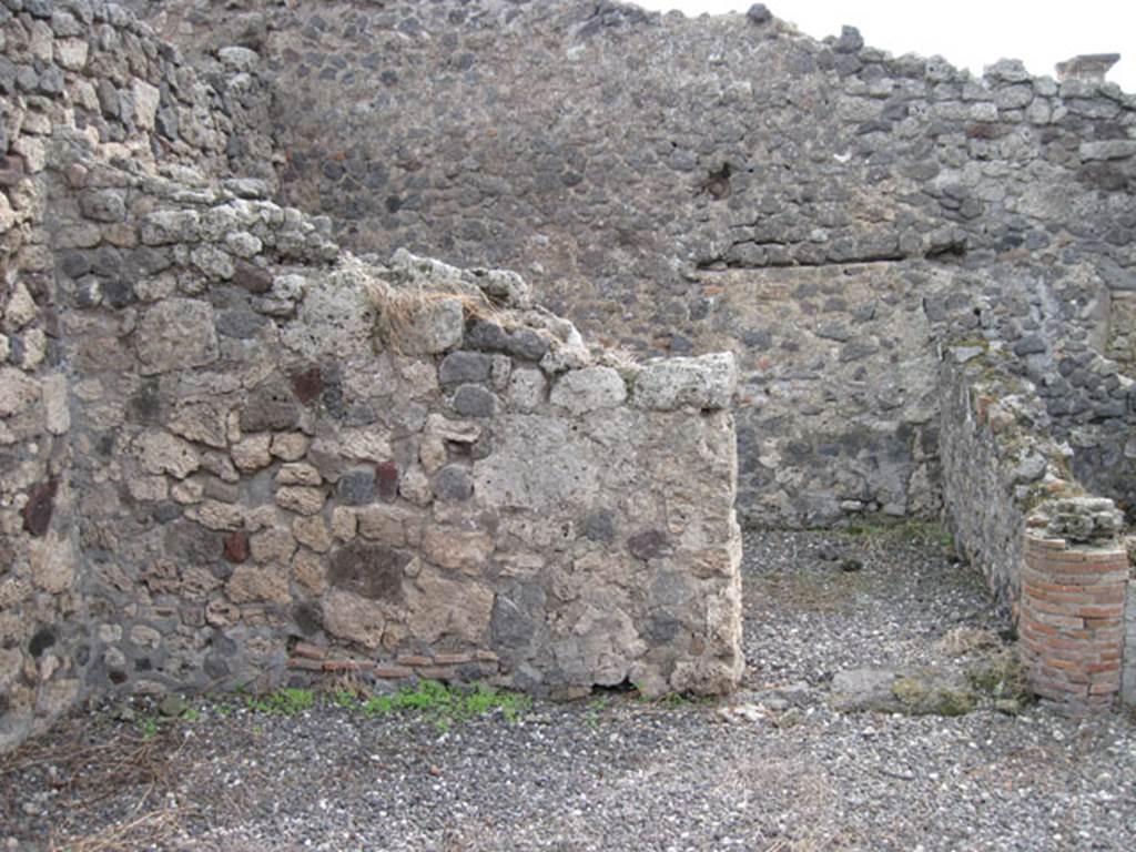 I.3.10 Pompeii. September 2010. Looking south to doorway to eastern room in south-east corner. Note blocked up doorway leading to I.3.8b. Photo courtesy of Drew Baker.