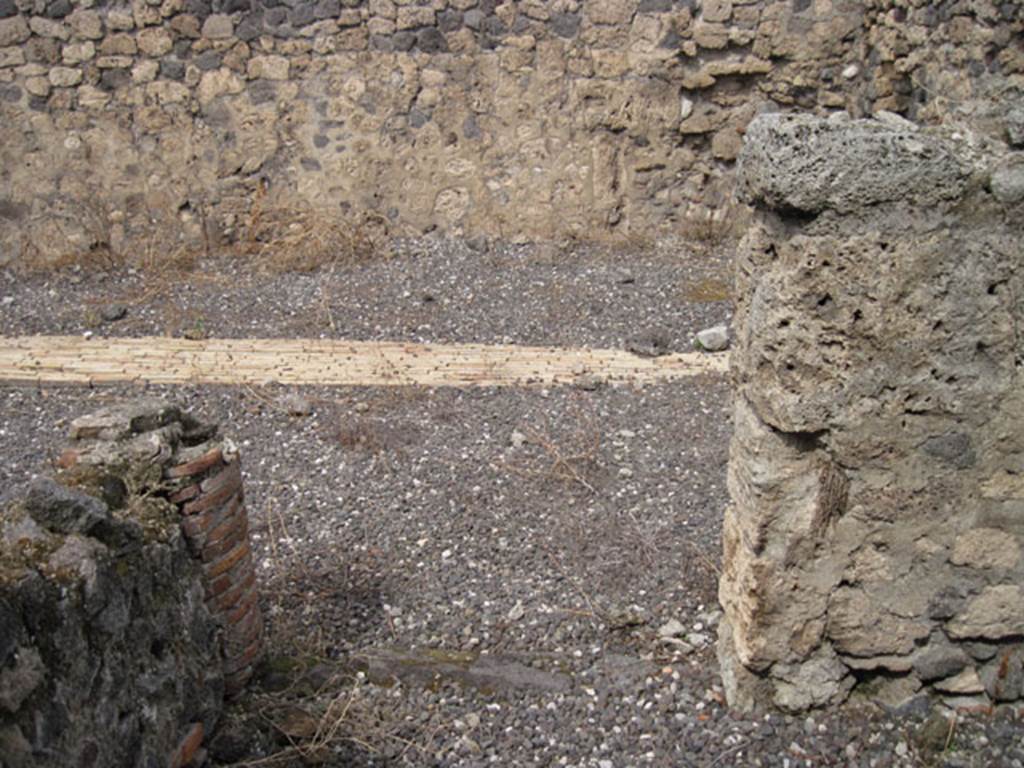 I.3.10 Pompeii. September 2010. Looking north through doorway from eastern room.
Photo courtesy of Drew Baker.