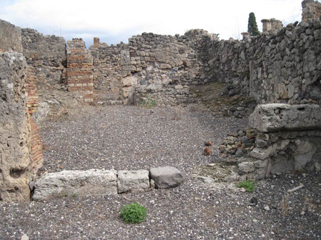 I.3.10 Pompeii. September 2010. Looking east towards doorway to the first rear room on the south side, and across room to the other rear rooms. Photo courtesy of Drew Baker.