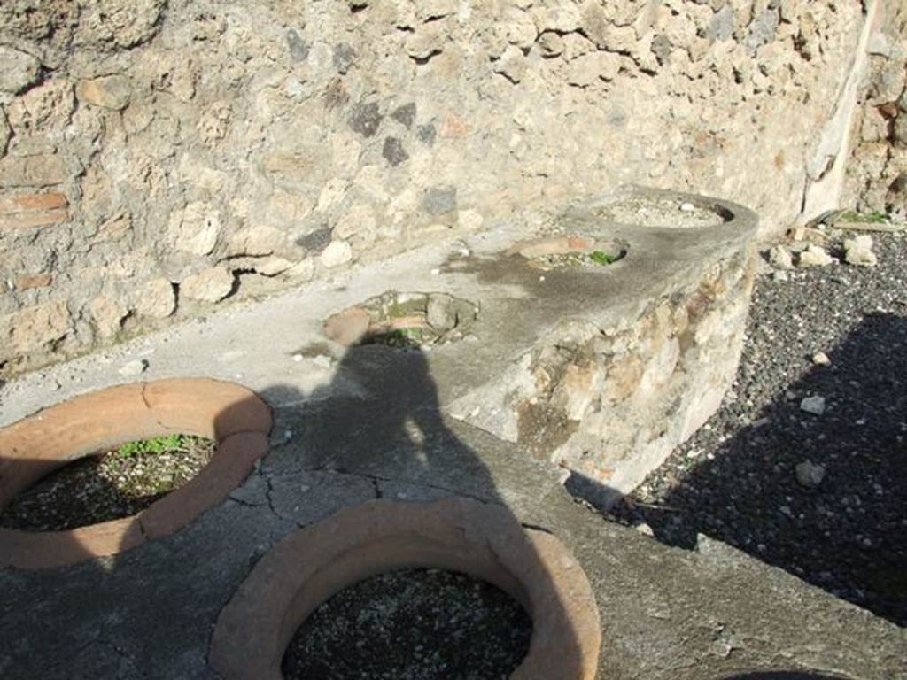 I.3.11 Pompeii. December 2007. Counter with five of the eight dolia.