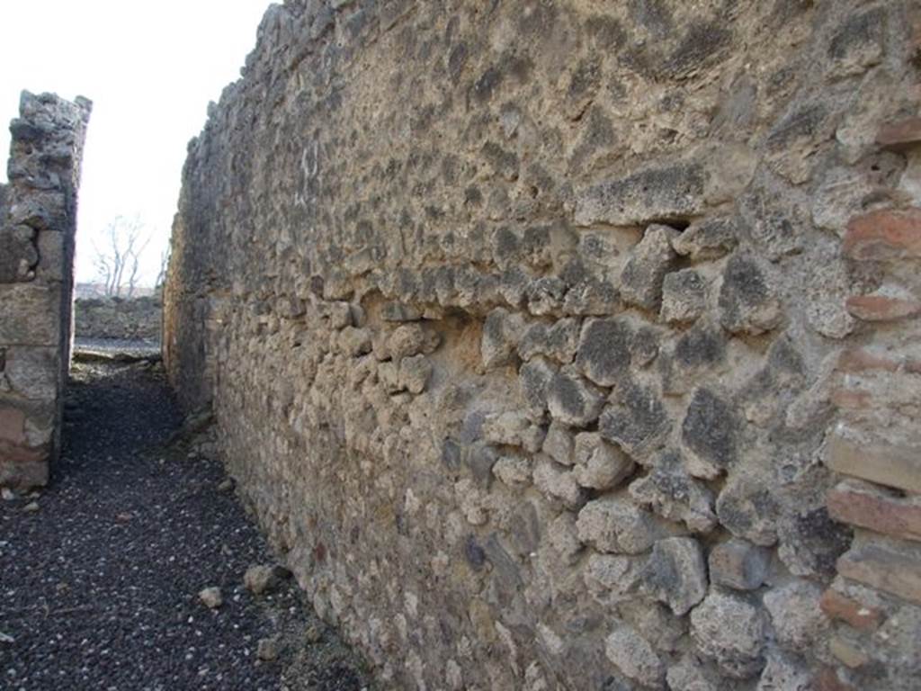 I.3.14 Pompeii. December 2007.
West wall and corridor to narrow area behind which is shared with I.3.13.