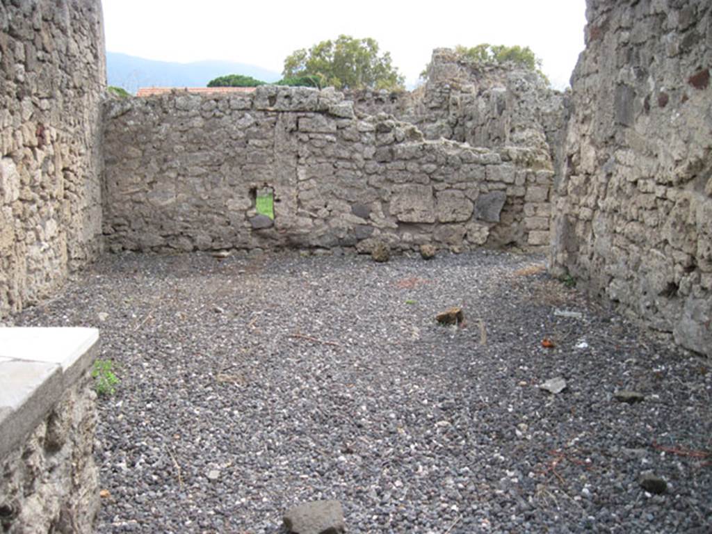 I.3.22 Pompeii. September 2010. Looking south across bar-room from entrance doorway.
Photo courtesy of Drew Baker.