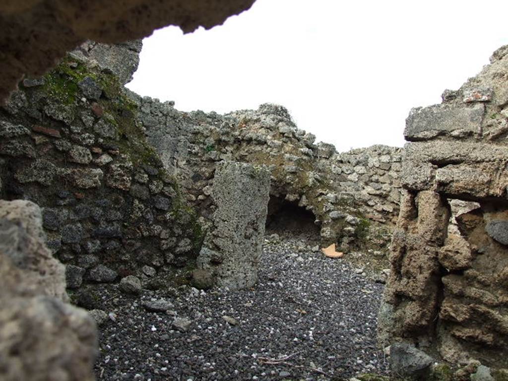 I.3.23 Pompeii. December 2006. Looking north-west across kitchen towards steps to upper floor, photo taken from I.3.25.