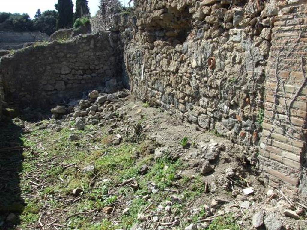 I.3.27 Pompeii. March 2009. North wall of room or stall in north west corner.