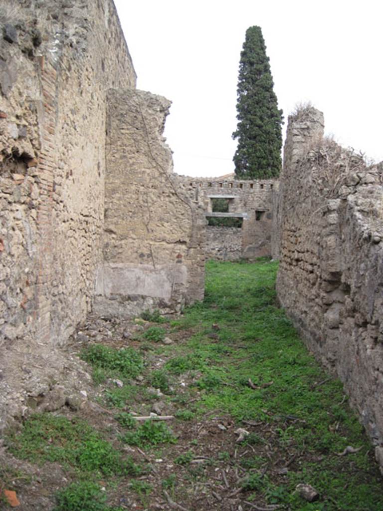 I.3.27 Pompeii. September 2010. Looking towards east wall and doorway of room, and across bakery room towards entrance doorway. Photo courtesy of Drew Baker.