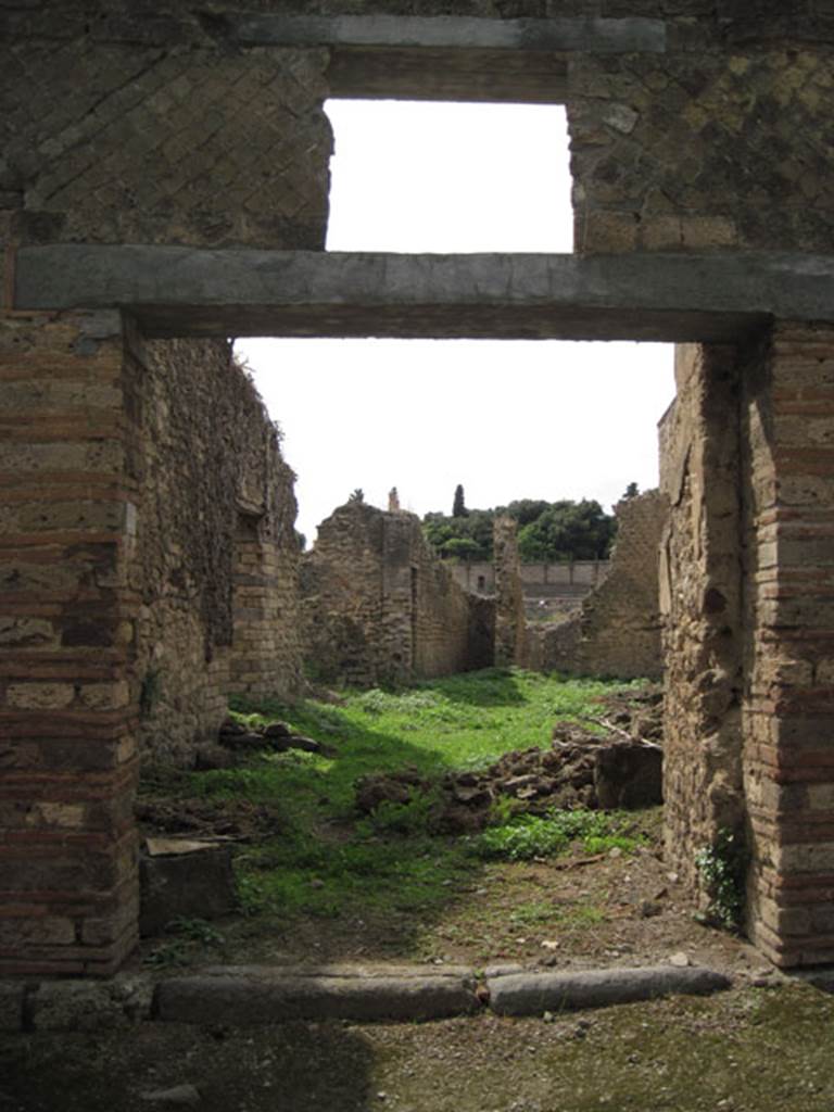 I.3.27 Pompeii. September 2010. Looking west to entrance doorway. Photo courtesy of Drew Baker.