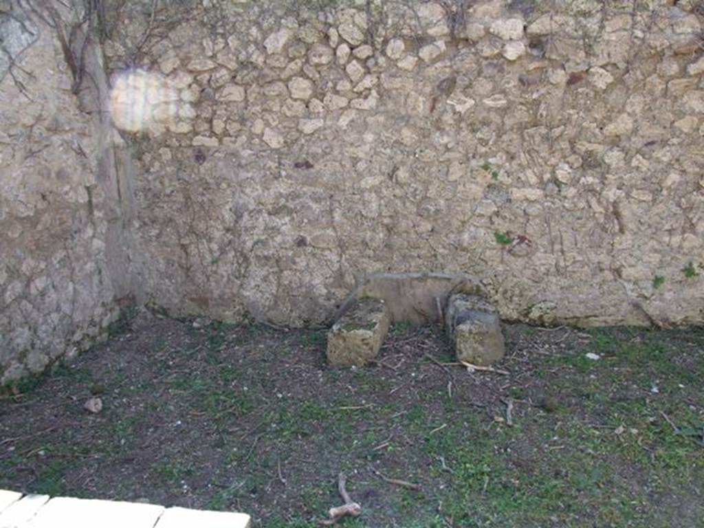 I.3.28 Pompeii. March 2009. West wall with remains of a feature, and south-west corner.
According to CTP, there is now no trace of the stairs which may have been constructed against the south wall in the south-west corner. See Van der Poel, H. B., 1986. Corpus Topographicum Pompeianum, Part IIIA. Austin: University of Texas. (p.6)