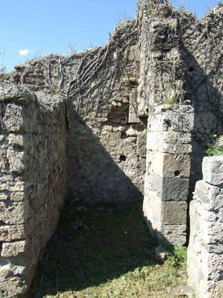 I.3.29 Pompeii. March 2009. Looking north into small room with stairs to upper floor at the far end. Entrance to Room 3, on the right hand side.