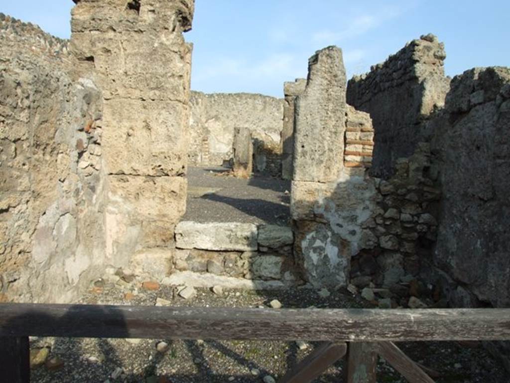 I.4.1 Pompeii. December 2007. Door to atrium of I.4.2 in east wall of shop.