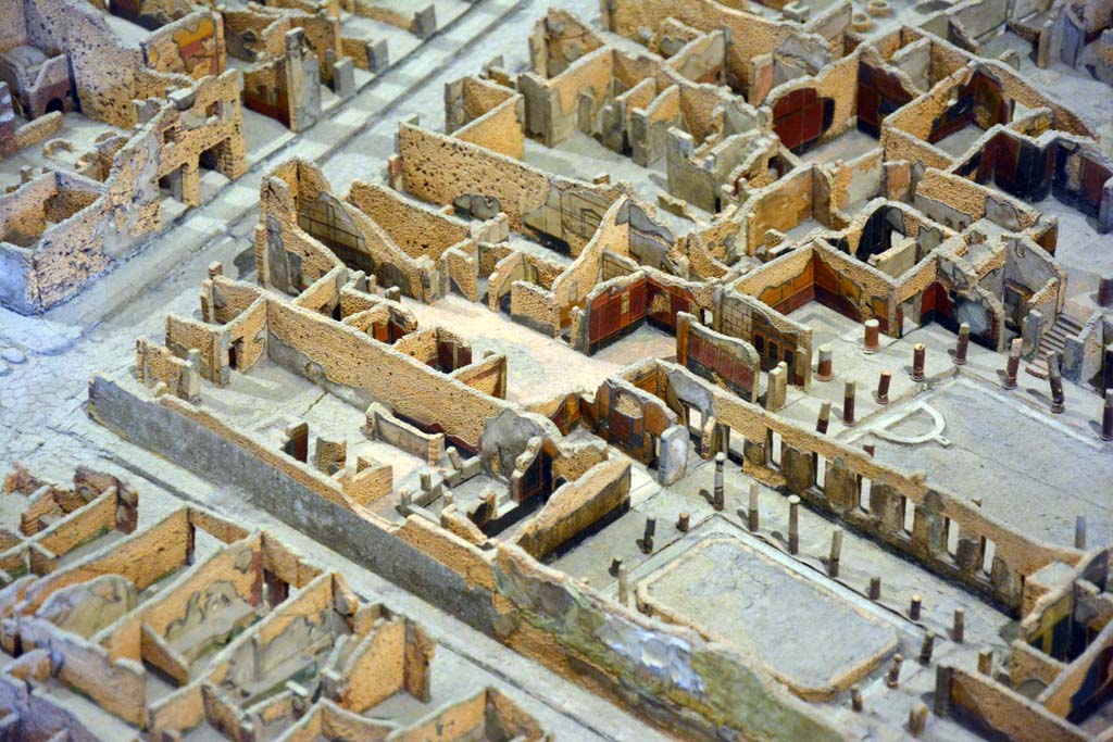 I.4.2 Pompeii, centre left. October 2019. Looking north-west.
On left is Via Stabiana, at junction with Vicolo del Menandro, I.4.2 is on the left, on the north side of the roadway.
Foto Tobias Busen, ERC Grant 681269 DÉCOR.
