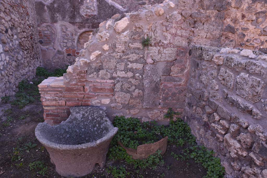 I.4.12 Pompeii. October 2019. Room b, looking south towards wall in south-west corner of bakery room, with doorway to room d, on left.
Foto Tobias Busen, ERC Grant 681269 DÉCOR.
