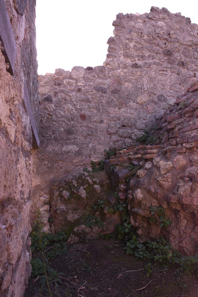 I.4.12 Pompeii. October 2019.
Looking south along east wall towards second doorway, on left, leading into room e, on east side of oven.
Foto Tobias Busen, ERC Grant 681269 DÉCOR.