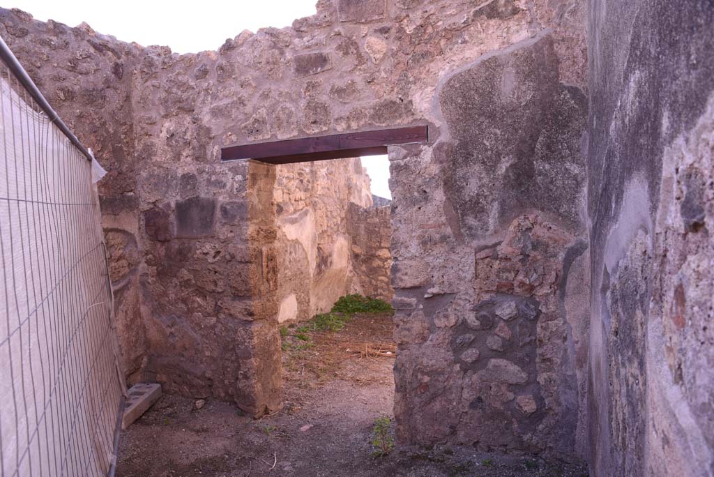 I.4.19 Pompeii. October 2019.
Looking towards south wall with doorway to rear room, on the left would have been the base of the stairs for an upper floor.
Foto Tobias Busen, ERC Grant 681269 DÉCOR.