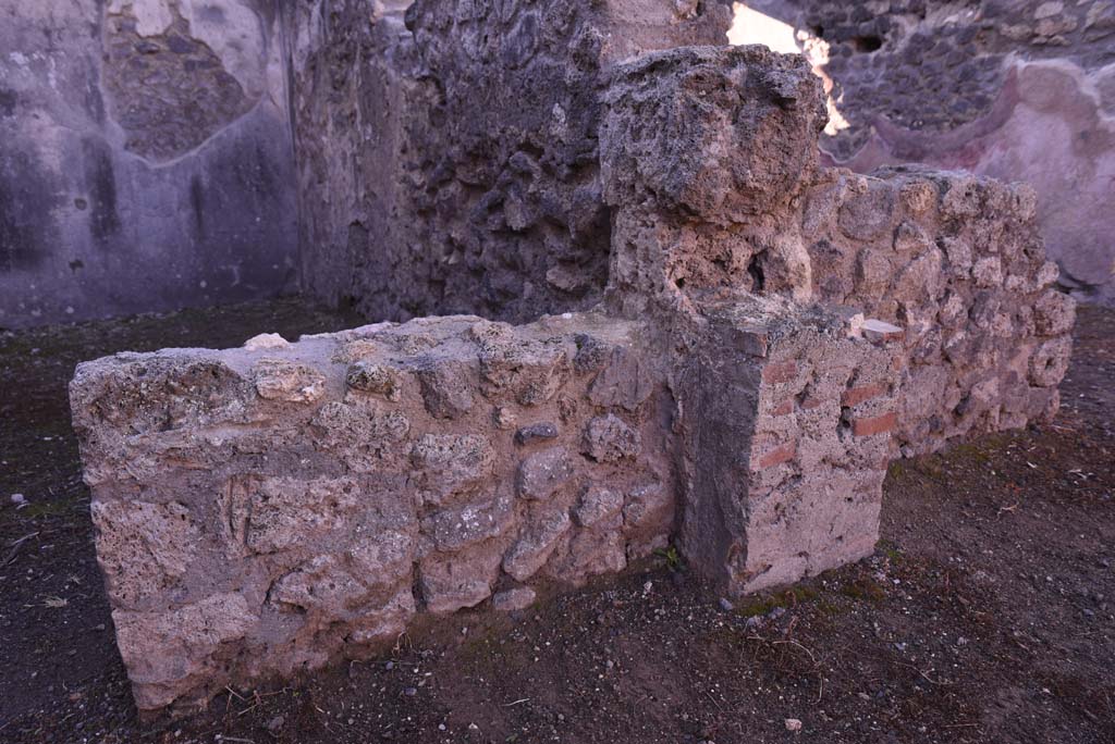 I.4.24 Pompeii. October 2019.
Looking south to west side of dividing wall between shop and rear room, with I.4.23, on right.
Foto Tobias Busen, ERC Grant 681269 DÉCOR.