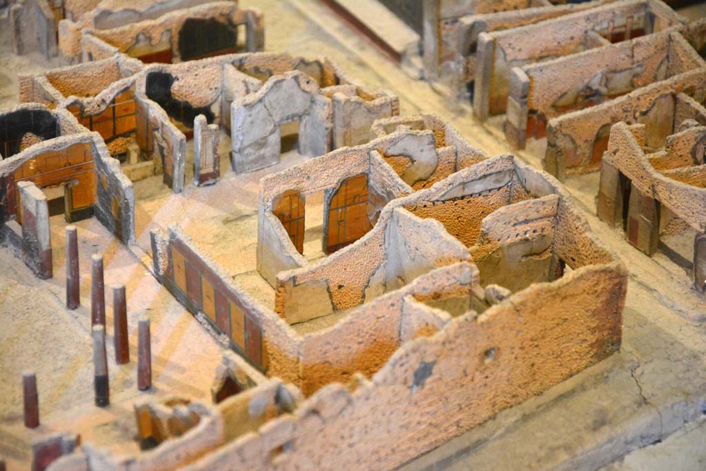 I.4.25 Pompeii. May 2019. Detail from model in Naples Archaeological Museum.
Looking north-west from above Vicolo del Citarista, bottom right, towards atrium and north portico of upper peristyle.
The entrance corridor/fauces is on the upper centre right on the Via dell’Abbondanza.
The north portico of upper peristyle 56 is on the left.
Foto Tobias Busen, ERC Grant 681269 DÉCOR