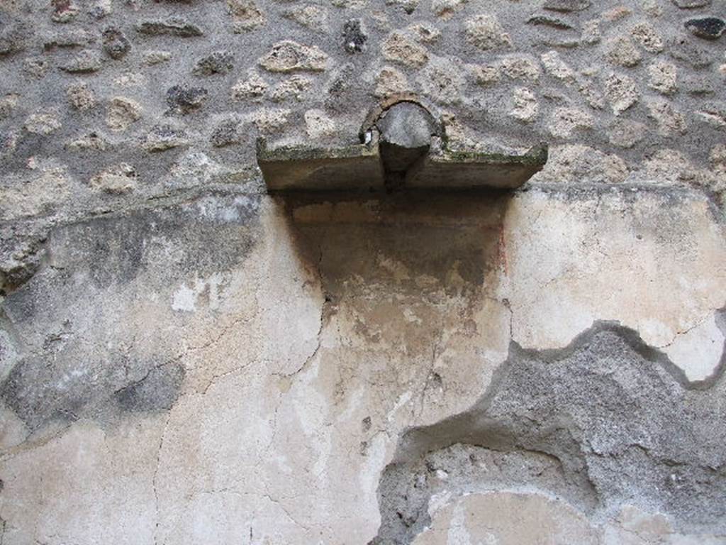 I.4.25 Pompeii. December 2006. Room 50, north wall with protection for central painting.