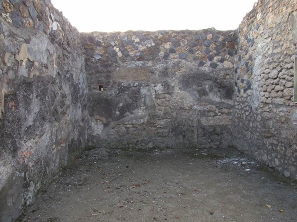 I.4.25 Pompeii. December 2007. Room 37, triclinium on west side of lower peristyle.
Looking at west wall. The west wall used to have a wall painting of Endymion and Selene.
The south wall used to have a wall painting of Adonis and Aphrodite.
Both these paintings are now lost. The floor was black and white marble.
There seems to be some confusion as to what was on the south or west walls, see Warscher above.
According to Warscher – on the west wall one cannot see any traces of decoration.
The room gives the impression of total devastation: it was difficult to show that it had been adorned with paintings.
(Sulla parete ovest non si vede nessuna traccia di decorazione.
La stanza da l’impressione d’una devastazione totale: era difficile rappresentarci che essa fosse adorna di quadri.)
See Warscher, T. 1942. Catalogo illustrato degli affreschi del Museo Nazionale di Napoli. Sala LXXXII. Vol.4. Rome, Swedish Institute