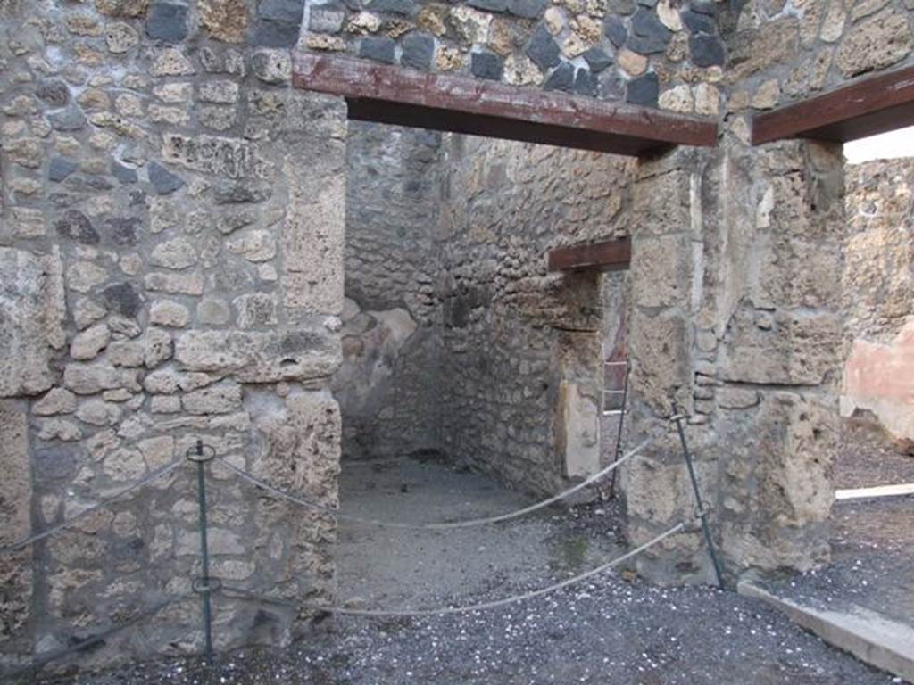 I.4.25 Pompeii. December 2007.
Doorway to room 36, cubiculum on north side of room 37, with a connecting door to the tablinum 14, on right.