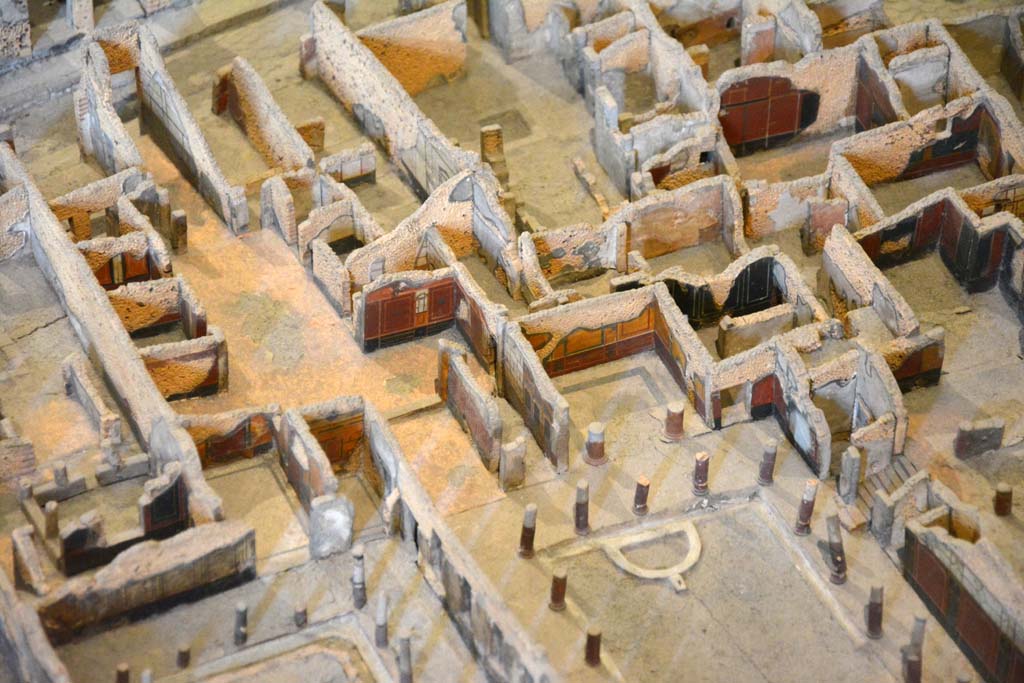 I.4.25/1.4.5 Pompeii. May 2019. Detail from model in Naples Archaeological Museum.
Looking north-west from above Middle Peristyle 17, lower centre right, and Tablinum 14 leading into atrium of I.4.5, centre left.
Foto Tobias Busen, ERC Grant 681269 DÉCOR.
