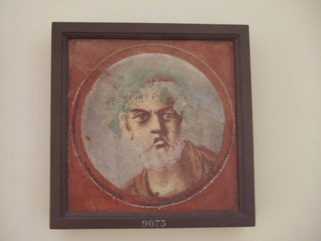I.4.25 Pompeii. December 2007. Room 18, west wall. Painted medallion of an old man with grey beard.
Now in Naples Archaeological Museum. Inventory number 9073.