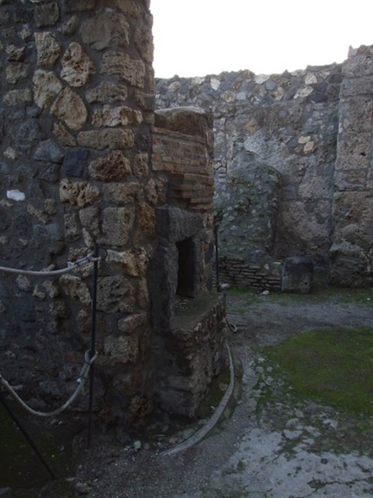 I.4.25/I.4.5 Pompeii. December 2007.
Room 42, looking west in kitchen with oven, or furnace for baths?