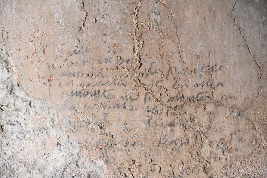 I.4.25/I.4.5 Pompeii. September 2020. Unnumbered corridor/room, detail of writing on east wall.
Foto Tobias Busen, ERC Grant 681269 DÉCOR.
