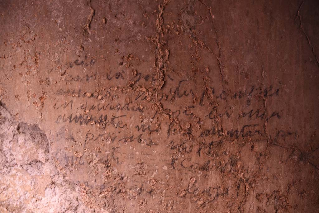 I.4.25/I.4.5 Pompeii. October 2019. Unnumbered corridor/room, detail of writing from east wall.
Foto Tobias Busen, ERC Grant 681269 DÉCOR.