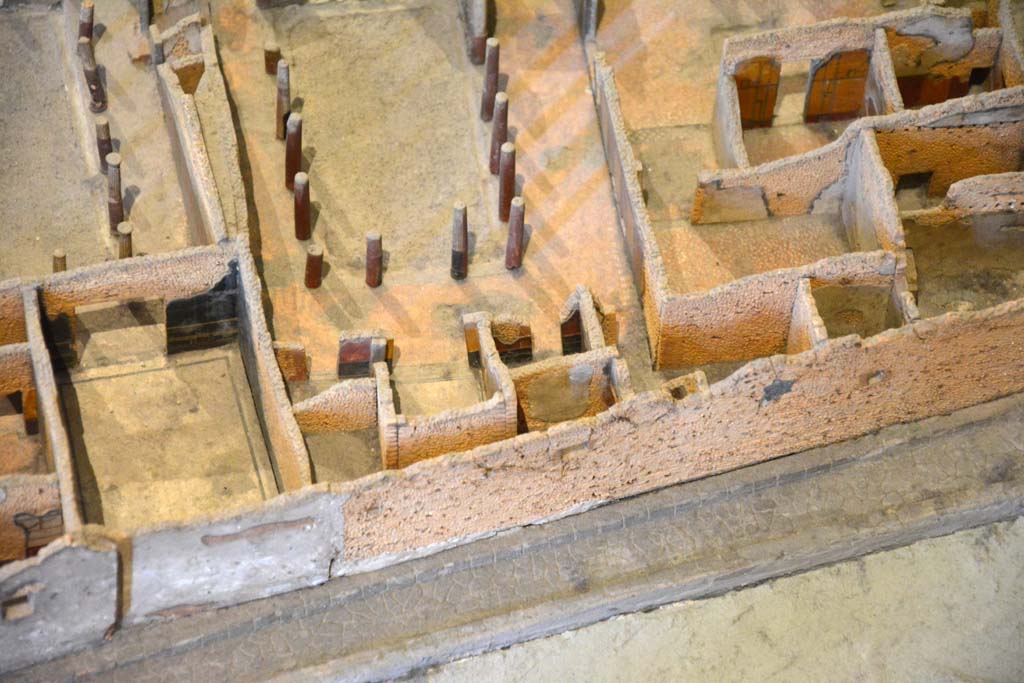 I.4.25 Pompeii. Upper Peristyle 56. May 2019. Detail from model in Naples Archaeological Museum.
Looking at east end of upper peristyle 56, with rooms 59 to 64, lower centre.
Foto Tobias Busen, ERC Grant 681269 DÉCOR.