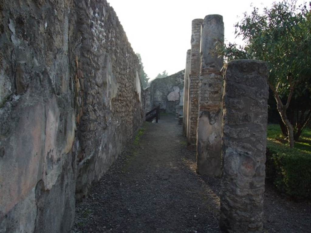 I.4.25 Pompeii. December 2007. Looking west along the south portico of the upper peristyle 56.