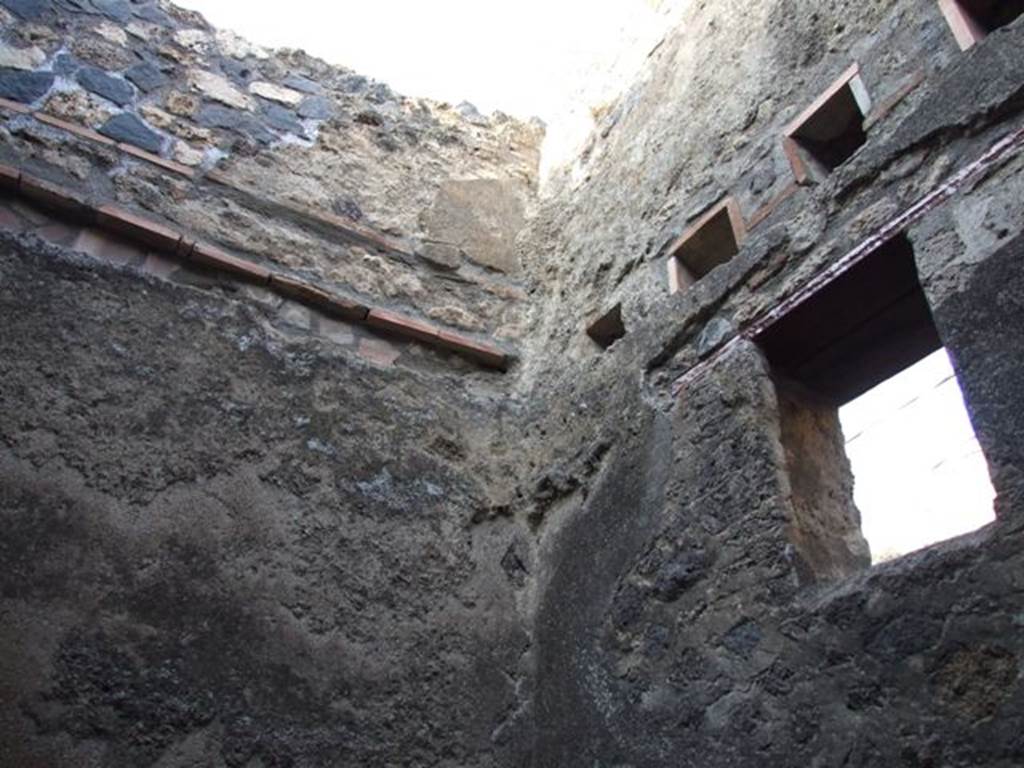 I.4.27 Pompeii. December 2007. North-east corner of rear room with window in east wall looking onto Vicolo del Citarista.