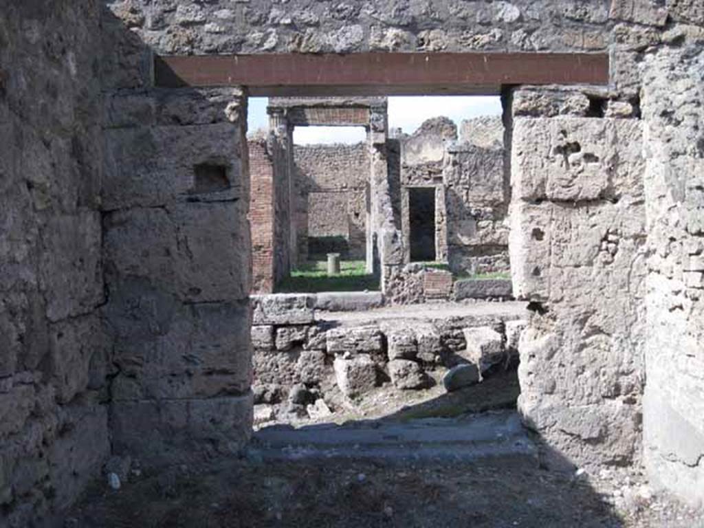 I.5.1 Pompeii. September 2010. Doorway of I.5.1 onto Vicolo del Conciapelle, looking north towards I.2.28 on opposite side of the vicolo.
Photo courtesy of Drew Baker.