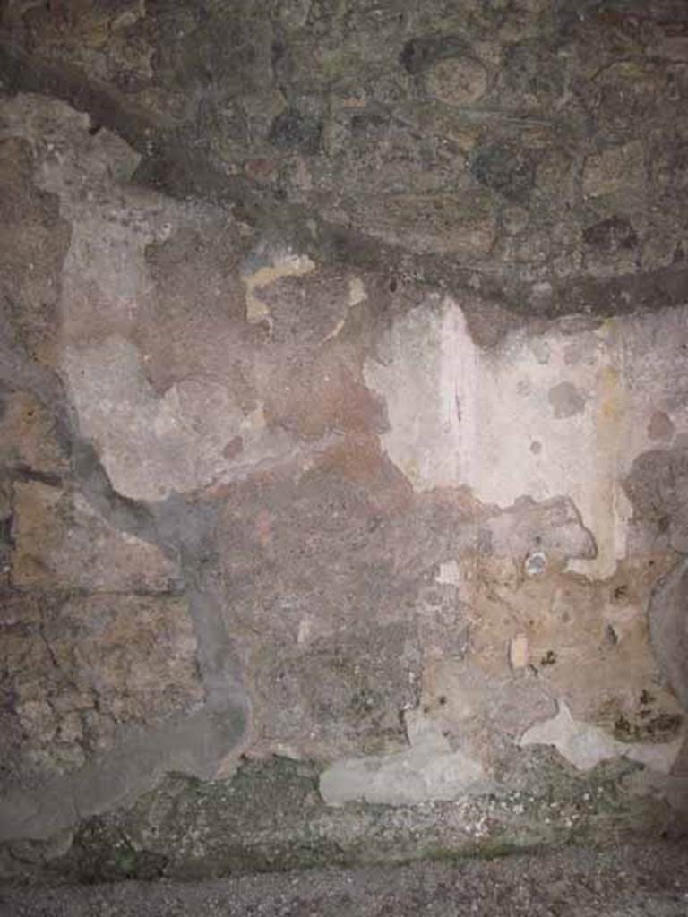 I.5.2 Pompeii. September 2010. East wall of small room, centre with fresco work. Photo courtesy of Drew Baker.