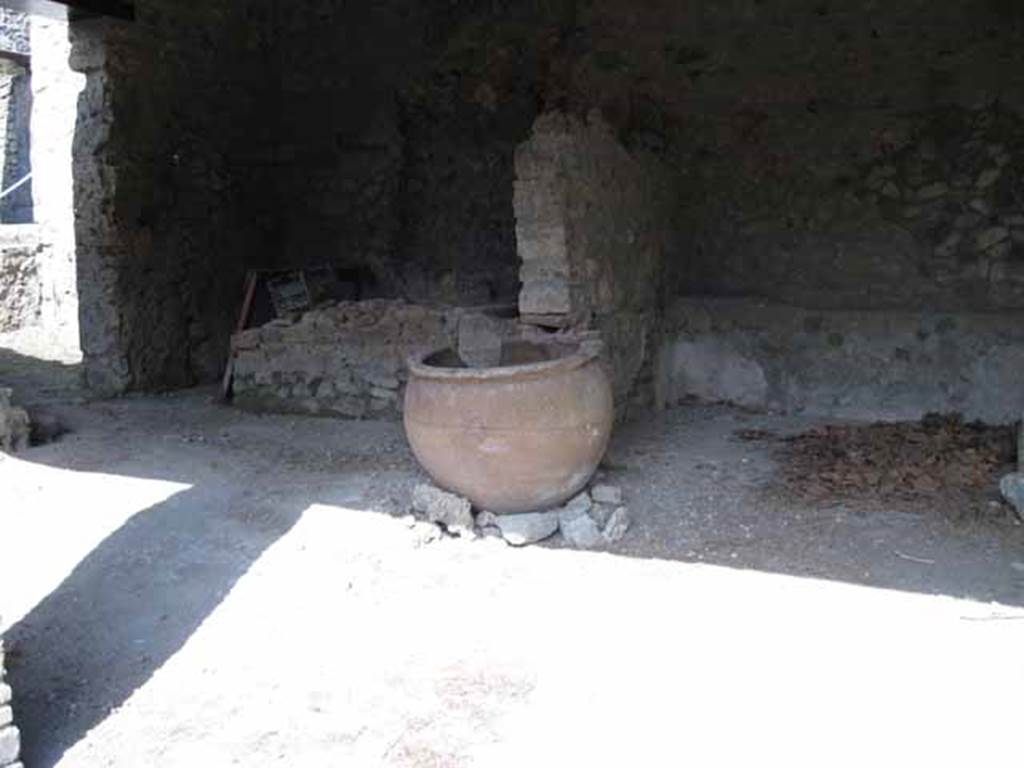 I.5.2 Pompeii. September 2010. Looking east towards the sixth (left) and fifth (right) divided compartments, in the east portico. Photo courtesy of Drew Baker.