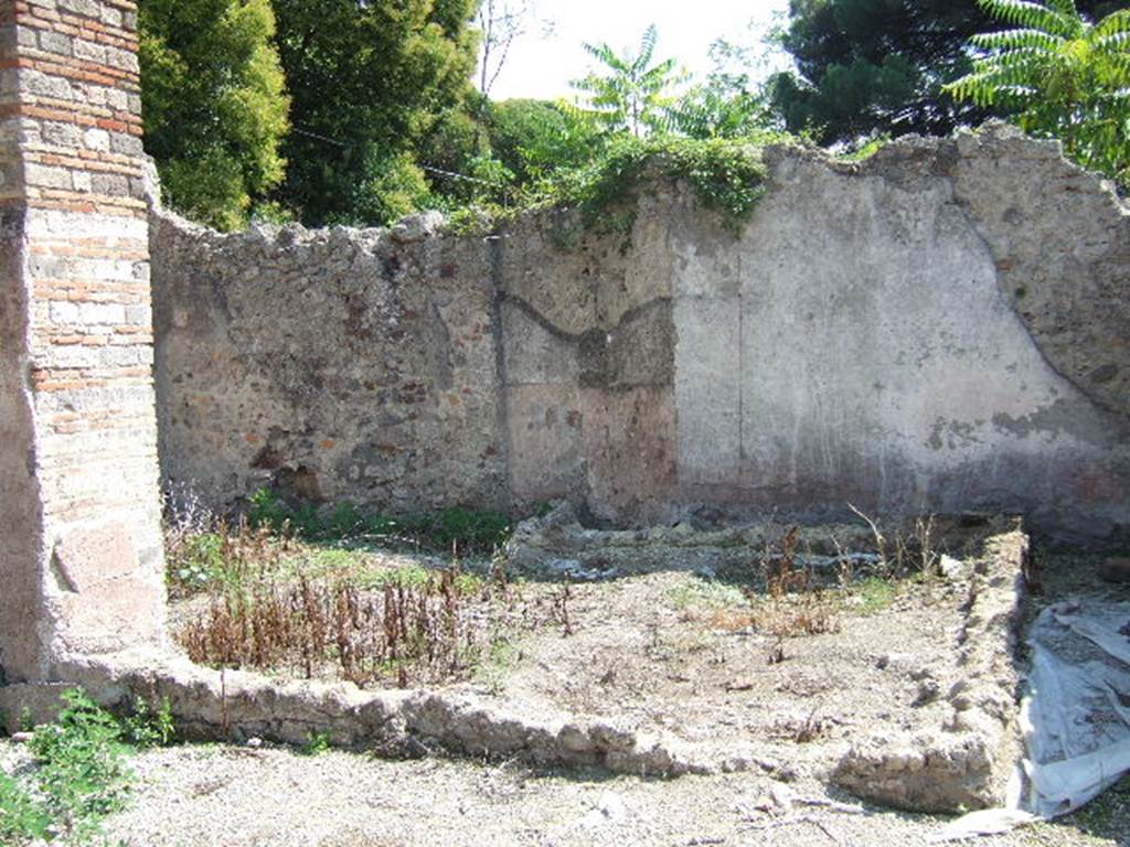 I.5.2 Pompeii. September 2005. Looking south-east towards south wall of industrial room.