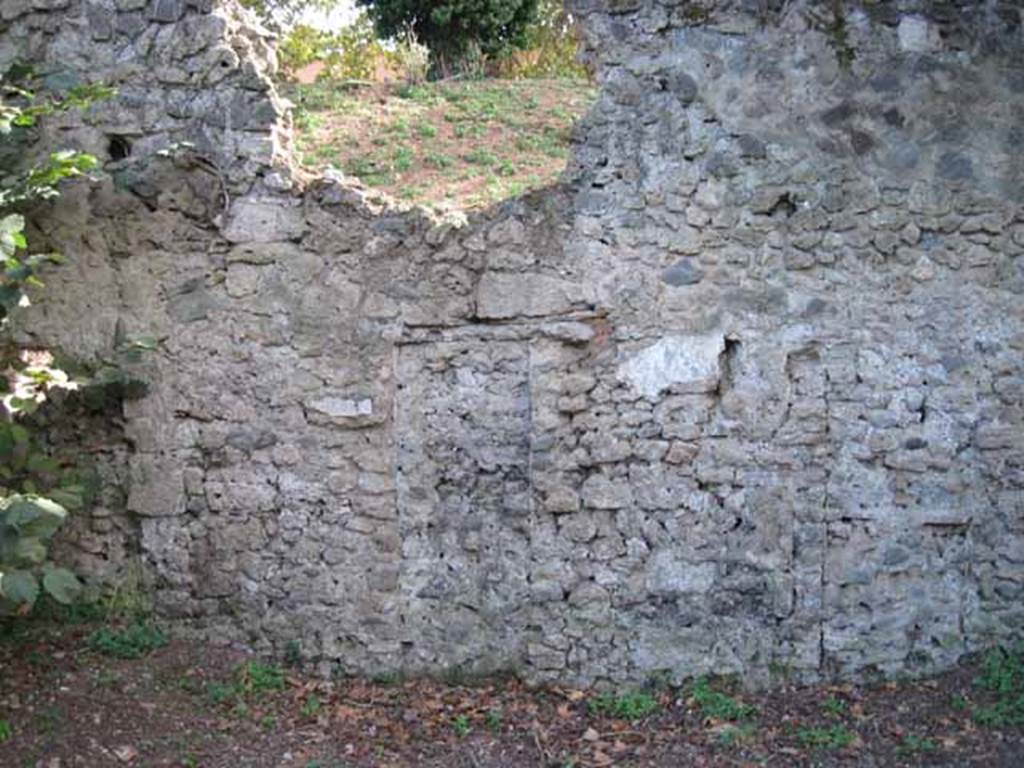 I.5.2 Pompeii. September 2010. South wall. Detail of blocked up doorway (left side of wall) leading to unnamed vicolo running between I.V and city walls, looking south towards wall. Photo courtesy of Drew Baker.