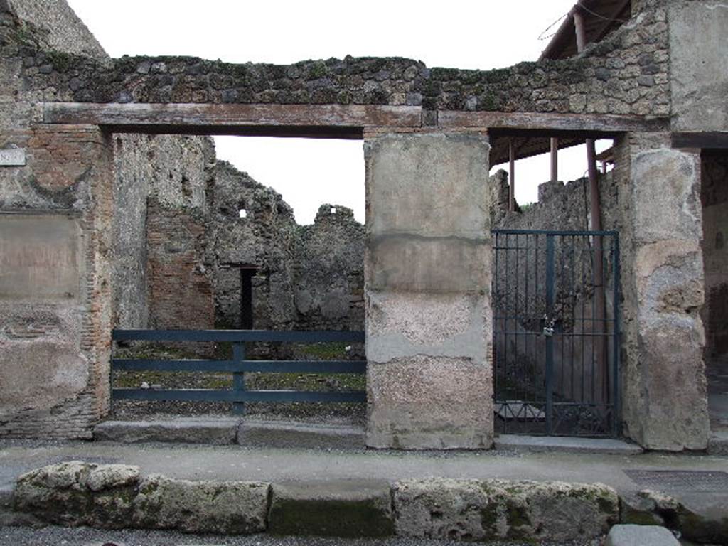 Painted graffiti between I.6.1 and I.6.2 December 2006. See Della Corte, M., 1965. Case ed Abitanti di Pompei. Napoli: Fausto Fiorentino. (p. 289)
According to Della Corte, the following electoral recommendation was found on the left of entrance number 2:
Carum II vir. v. a. s. Vicini facite CIL IV 7132.
Today it is hardly readable.