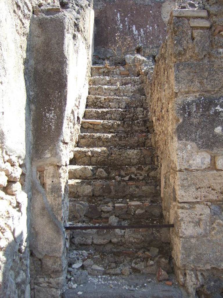 I.6.2 Pompeii. May 2006. Stairs to upper floor, on east side of atrium.