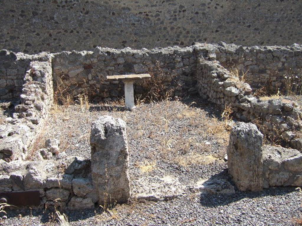 I.6.2 Pompeii. May 2006. Room on east side, with marble table.