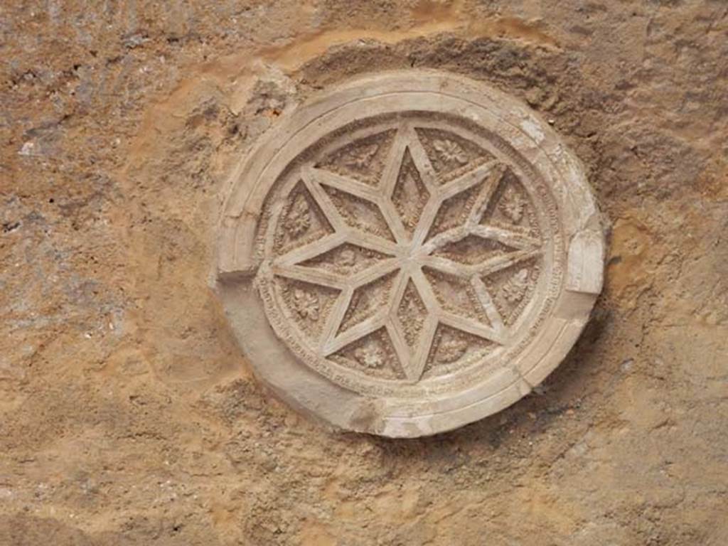 I.6.2 Pompeii. May 2016. Detail of piece of stucco from ceiling of north wing of cryptoporticus.  Photo courtesy of Buzz Ferebee.
