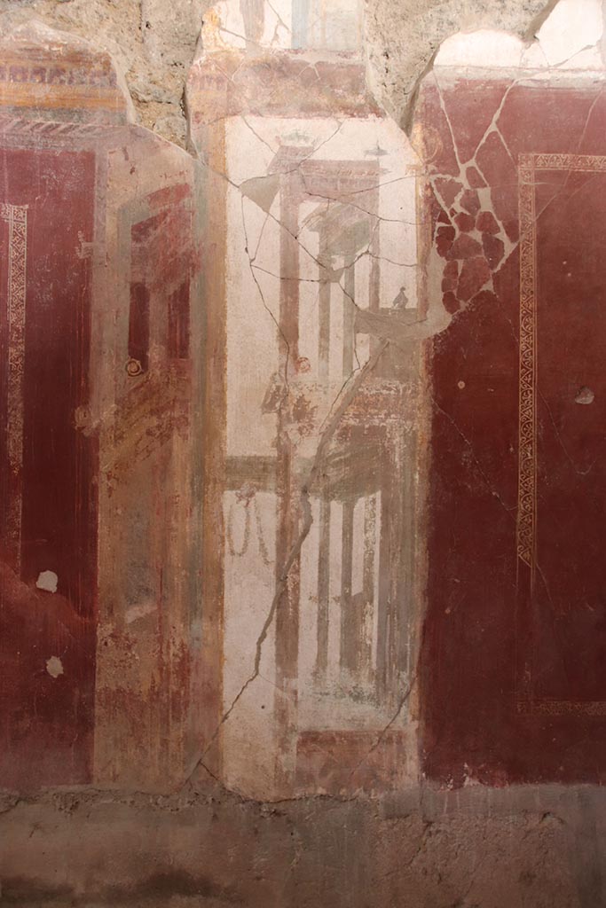 I.6.4 Pompeii. October 2024.
Room 2, detail of painted decoration from north wall towards east end. Photo courtesy of Klaus Heese.